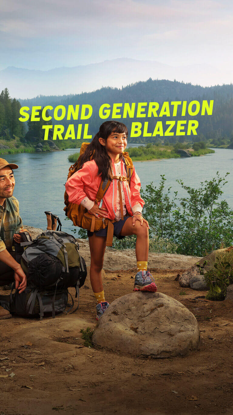 Image of a father and daughter
  camping, with text "Second generation trailblazer"